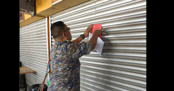 关丹市议会将对无法如期缴还所拖欠租金的店铺，进行锁店行动。（取自关丹市议会面书） 