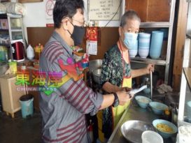 行动党哥本苏丹支部派口罩手套