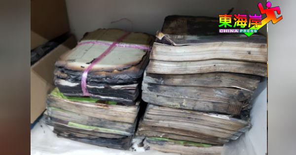 从旧址火场中被寻获的文件书籍，是林明民众图书馆仅存的历史见证。