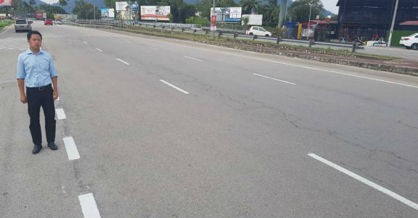 陈俊广巡视马路线，关丹米昔拉及哈兹阿末路交通灯交接点路段，已经重新划上。