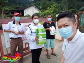 李达华访武吉丁宜华校 赠口罩消毒液防疫