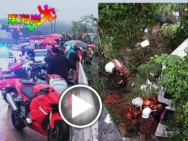轿车雨中失控   撞进桥旁河边