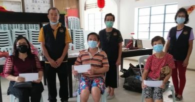 林明广肇龙母福利组      派发礼劵餐食给65户家庭
