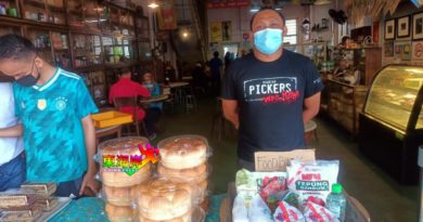 携手设食物银行     不分种族可自取