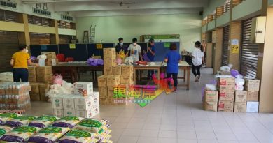 人间慈善社  丹华校董联会  400份资粮派学生家庭