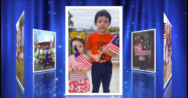 学生们通过拍摄居家庆祝国庆月视频，不忘挥舞国旗。