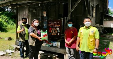 丹辉煌文化城狮子会 送暖一家8口贫户