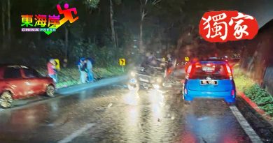 轿车雨中翻覆  伤者被救出