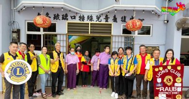 文冬劳勿3狮子会  送暖不幸者 为学生打气
