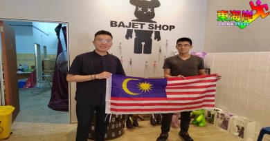 配合国庆日来临    谢东成派国旗倡爱国