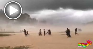 暴风雨袭击 游客逃离沙滩（有视频）