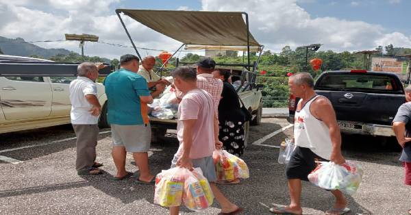 赈灾剩余义款改为送粮食物资，林明山镇500户村民受惠。