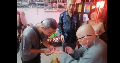 觉之家行善布施组办新春活动    送礼篮派红包 为弱群体送暖